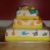 Alphabet Soup Bedding Cake This cake was designed to look like the bedding the baby will have. It is called Alphabet soup. All fondant work. Handmade baby rump topper...