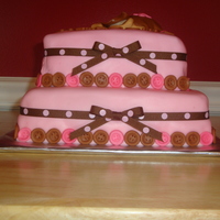 Buttons, Ribbons 'n' Rumps This is a marble cake (white & chocolate). First time I had made a marble cake, so go easy on me! Fondant covered, 2-tier cake. 8&quot...