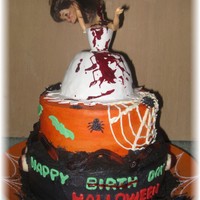 Halloween Birthday 2 tier halloween/birthday cake all in bc with some fondant accents.