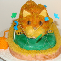 Annabelle's Cat Fish and "2"s are run in sugar with royal frosting. Eyes, nails, yarn, and basket are fondant. All the rest is buttercream. HUGE...
