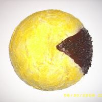 Pac-Man Cake I made this cake for a friend who loves Pac-Man, created by using a soccer ball cake tin.