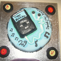 Ipod Birthday Cake My 2nd fondant cake. Chocolate cake with chocolate buttercream. everything is fondant. the Ipod is a separate cake covered in black fondant...