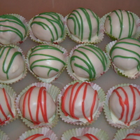 Christmas Cake Balls White cake with french vanilla creamer. White chocolate coating an drizzled with red and green.