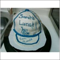 Cap Cake I used wilton fondant for this one(yuk) before I knew better, its a chocolate cake with a coconut buttercream filling