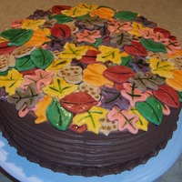 October Office Birthday Cake My office has a monthly birthday celebration and I offered to make the cake hopeing I didnt embarass myself. The leaves are colored fondant...