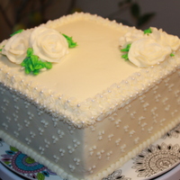 A Lot Of Firsts Here This is my first square cake, first buttercream roses, first wedding cake design type. It was fun to make. 8 in square really for practice...