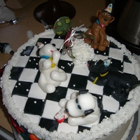 Therapy Dogs this is my first fondant dog/floor design. Its a 10 inch cake with buttercream sides made for a Therapy Dogs United auction. The event was...