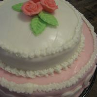 Pretty In Pink When my daughter was born, I made this cake .... chocolate and vanilla cake filled with delicious homemade jam and covered in fondant.