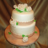 Wedding Cake For Small Reception Vanilla cake with Hazelnut buttercream. Gumpaste roses.