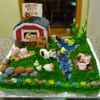 Durham Fair 2009 Farm Cake I entered this cake in my local fair and won 1st prize! It is my first ever contest. It is yellow cake with fondant and gumpaste animals...