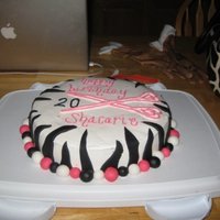 Zebra Angel food cake with buttercream and fondant.