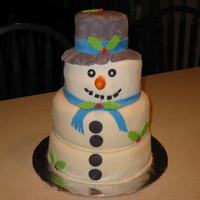 Christman Snowman My first snowman cake. All buttercream with fondant with chocolate filling.
