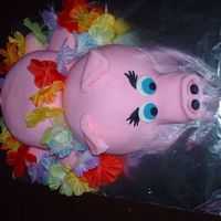 Luau Pig My first ever cake. I work in a facility with kids & we decided to have a "summer camp" for them, with the last day having a...