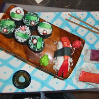 Sushi Sushi cake for a friend's birthday. The sushi board is the cake and all pieces are gumpaste and fondant.