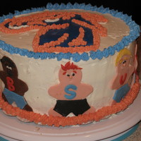Boise State Broncos Fiesta Bowl Cake! Go Broncos! Buttercream with fondant figures. WASC with dulce de leche filling.