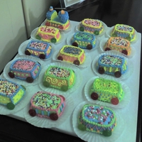 Train Cupcake And Cars Mini loaf pan cupcakes covered in Butter cream ,gummy savers for wheels, made train smoke stack with 2 mini mm and 1 lg mm secured with a...