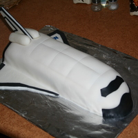Space Shuttle Sweet spaceshuttle, made of wanilla sponge cake with buttercream icing with pineapple. It took me over 6 hrs to make. Thx for watching and...