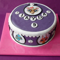 Petshop Birthdaycake Birthday cake for a 9-year old. Decorated with marzipan and icingsheets (pictures) and filled with almond buttercream