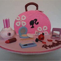 Barbie Makeup Bag I made this vanilla cake for my niece's 6th birthday. She was so excited when she saw it and wouldn't let her sister eat any of...