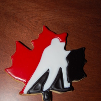 Canada Maple Leaf Hockey Cookies Canada Maple Leaf hockey cookies. These went up to Canada to our Toronto office that I work with regularly. Everything was freehand.