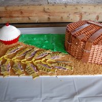 Fishing Creel, Bobber & Stringer Of Perch Cookie Fish - Wedding Cake This was a fishing creel and bobber cake with a stringer of handpainted Perch cookie fish. The bobber was a homemade chocolate cake recipe...
