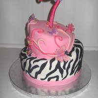 7Th Birthday Cake My niece saw a cake I had made for a baby shower with zebra and pink diamonds on the top layer. I have done that cake four times now, so I...