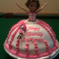 Za'kyrah Moxie Doll Cake MOXIE DOLL CAKE.. WASC, USED A 12" ROUND AND A METAL BOWL. MY FIRST DOLL CAKE FOR MY 8 YEAR OLD NIECE ZA'KYRAH. SHE LOVED IT.