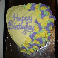 Yellow Birthday Cake Lemon Cake w/ lemon buttercream and pruple/yellow royal pansies