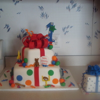 My First Birthday This was for a boys 1st Birthday .10 in. & 6 in. vanilla & buttercream, w/ 4 in. smash cake. This was my first time making a square...