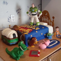 My Turn At Toy Story The bed is a 12x18 sheet. Buzz, Rex, and the toy box is RKT, everything else is fondant. TFL