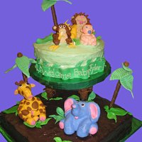 Jungle Baby Shower Cake I made this cake for a co-worker's baby shower. I've made cakes for my kids' birthdays before, but this was my first time...