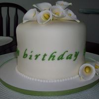 Birthday Cake This cake is a replica of the wedding cake the bride wanted. It was done as a birthday cake as a surprise to her.