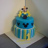 Mickey Mouse Birthday 2 Tier cake covered in fondant with gumpaste/fondant mickey for the topper.