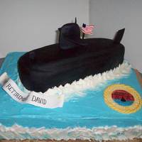 Submarine Military Cake Yellow cake covered in vanilla buttercream. Filled with chocolate ganache. Submarine is a carved yellow cake covered in fondant. TFL!
