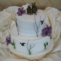 Nature Inspired Wedding Cake Nature inspired wedding cake. All items made off fondant/gumpaste/modeling chocolate. Cattails are from spaghetti noodles. Topper...