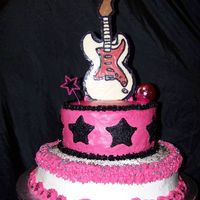 Rock Star Cake All buttercream except for star & disco ball. Guitar is made from chocolate.