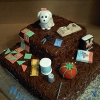 A Few Of Her Favorite Things I did this cake for a dear friend. She loves to quilt, read, and scrapbook. Her second child is her Maltese - "Britney"
