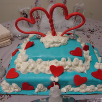 Raining Love my first decorated cake! I made the MMF and dyed it too! buttercream clouds and fondant hearts. Sour cream chocolate cake with Peanut...
