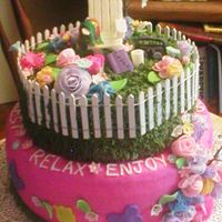 Flower Garden Retirement Cake This was made for a family friends retirement party..She is looking forward to reading in her flower garden, so it was made to depict her...