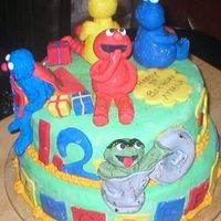 Sesame Street 1St Birthday Cake This is my first attempt at making fondant figures for a friends childs 1st birthday. The cake is covered in fondant and the figures &...