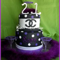 21St Birthday Chanel Cake 21st Birthday cake with Chanel logo around the top tier. Black/white/purple polka dots. Purple sugar rimmed martini glasses (non-edible)....