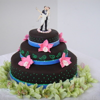 Chocolate Wedding Cake Made this cake like the bride requested, i think the chocolate brown fondant contrasts well with the bright pink orchids and green lace and...