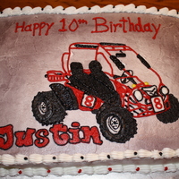Dune Buggy Birthday White cake with buttercream icing using a piping gel transfer