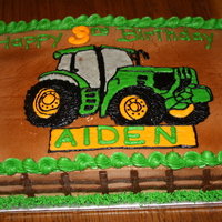 John Deere Birthday Cake Chocolate/Vanilla Cake with all buttercream icing, design done doing a piping gel transfer.