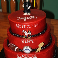 Graduation Cake All buttercream icing...airbrushed red. Chocolate tier, White tier, Strawberry tier.