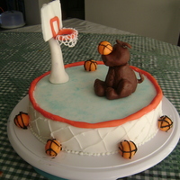 Basketball Dog My son loves basketball and dogs. So I made this cake for him. The basketball hoop and dog are gum paste, everything else is fondant but...