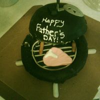 Bbq Grill I did this cake on the fly so I wasn't very happy with the overall results, but when we took it to church no one would cut into it...