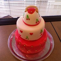 Cherry Purse Cake Two tiers (8",6") and mini doll cake mold for the mini purse. All fondant covered and decorations. Wilton red berry candies for...