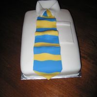 White Collar Father's Day Cake Made this for an early Father's Day cake... used fondant. It was a lot of fun!