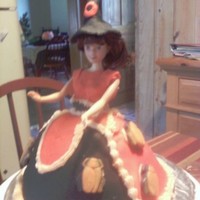 Halloween Witch Orange cake with orange b/c icing, dress is fondant, with b/c trim and gummy bugs. hat is fondant with O in honor of niece Olivia. Cake is...